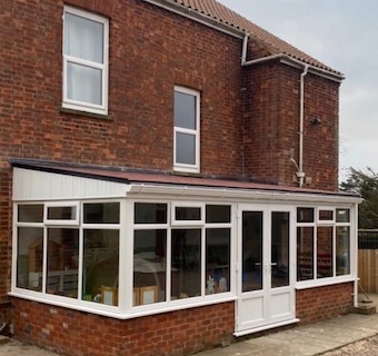 Conservatory and windows above